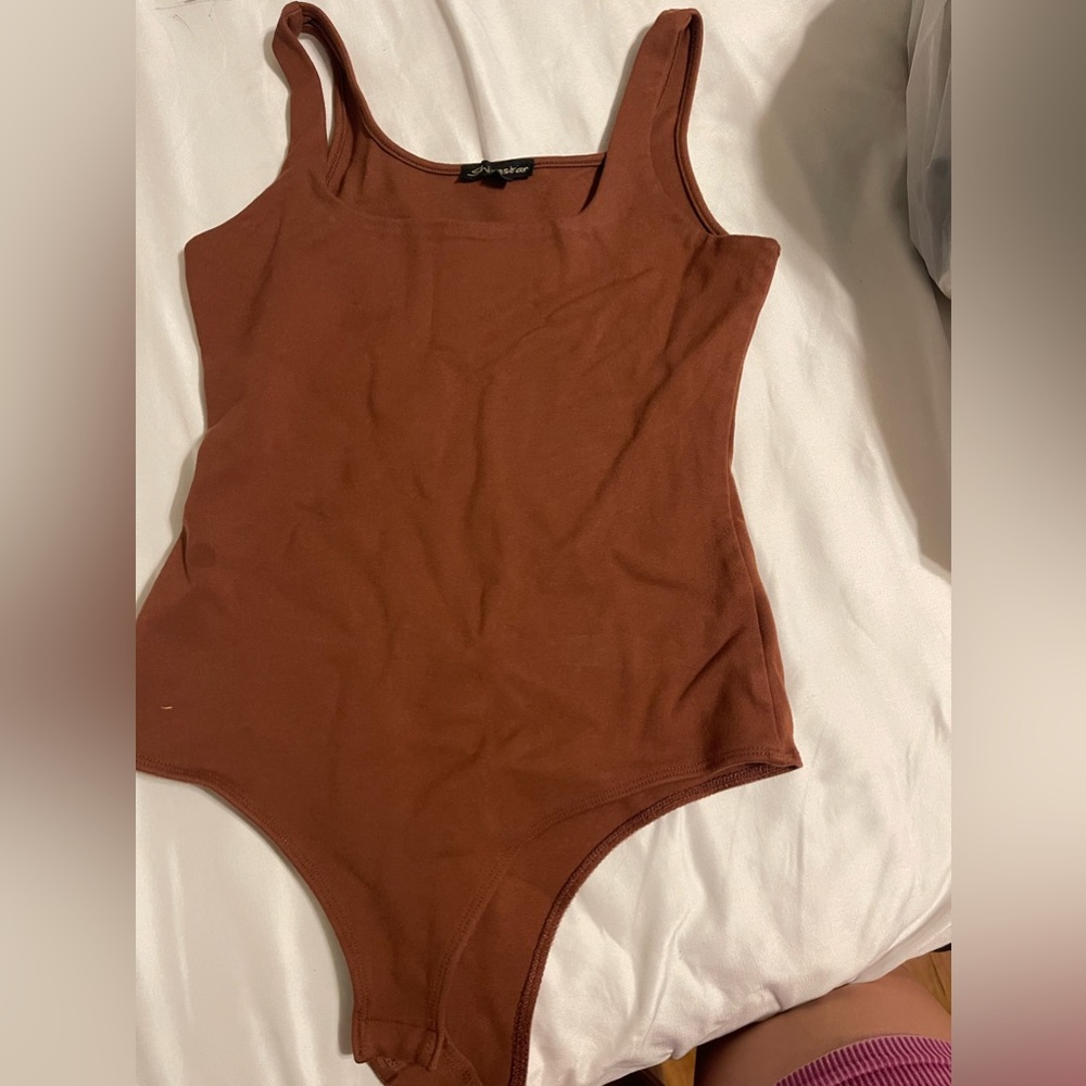 Beautiful sleeveless brown body suit